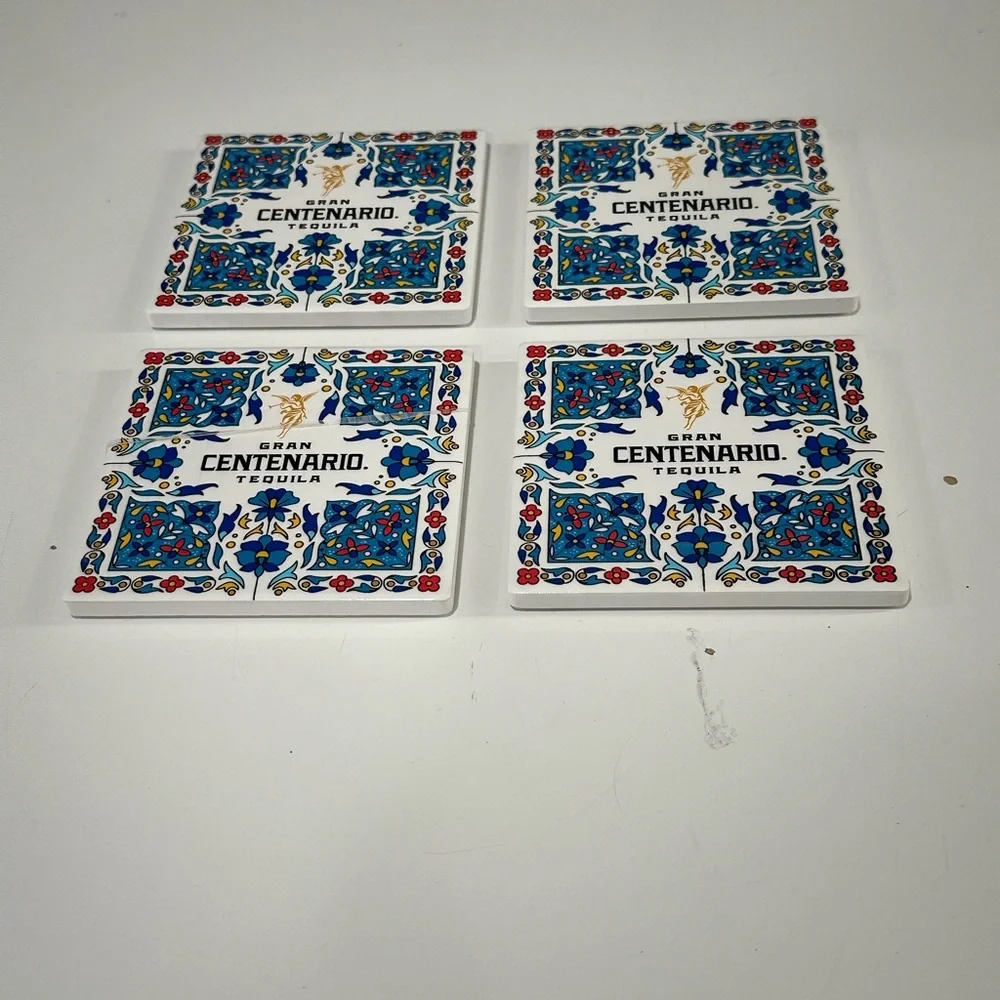4 set gran Centenario tequila colorful tile coasters. Cork bottom.